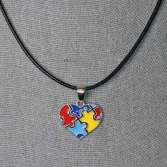 New Autism Awareness Necklace Heart Puzzle Piece Charm on Black Necklace Cord - Picture 6 of 8